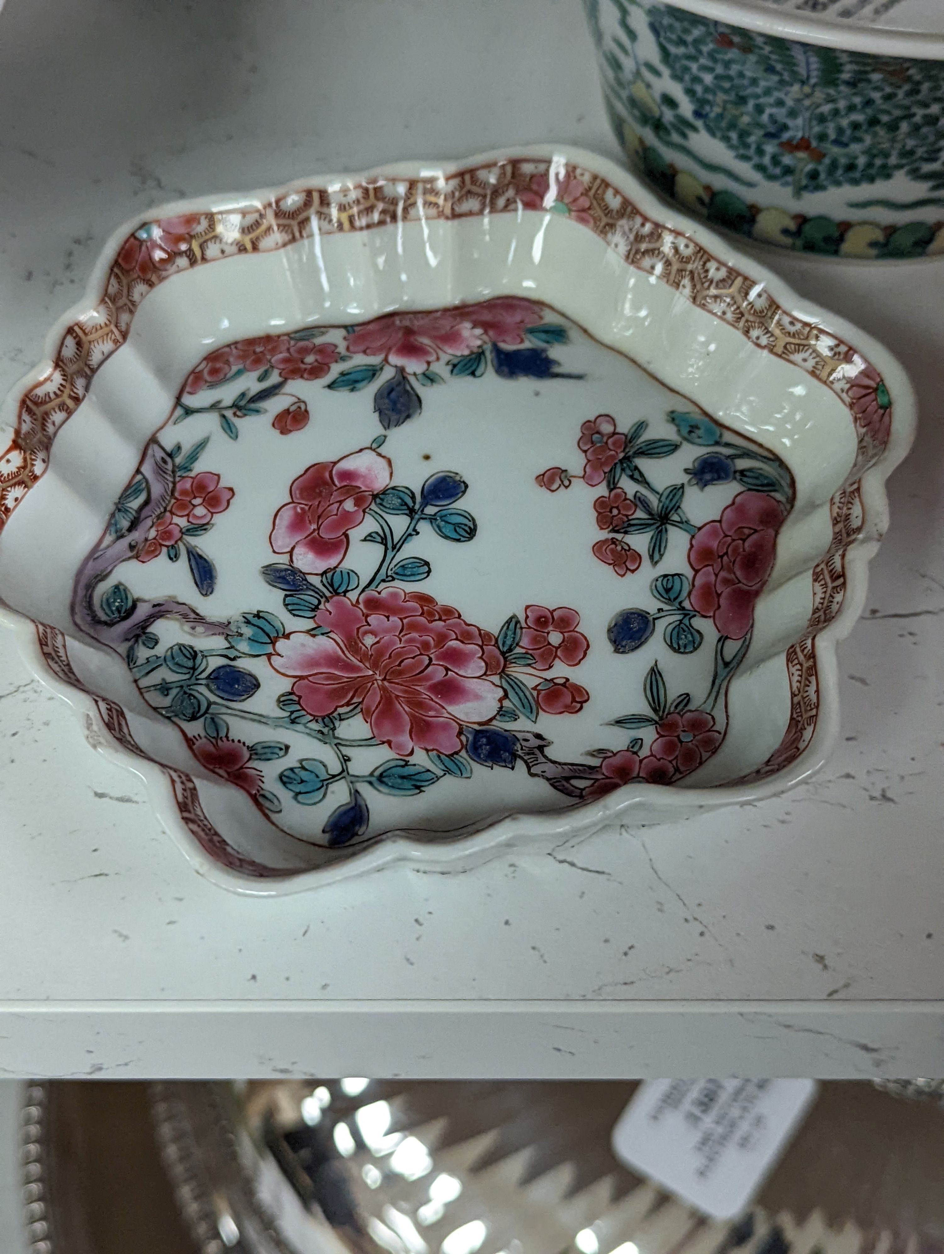A Chinese blue and white bowl, Kangxi, 15cm. diam., a famille rose teapot stand, Yongzheng, and two doucai bowls